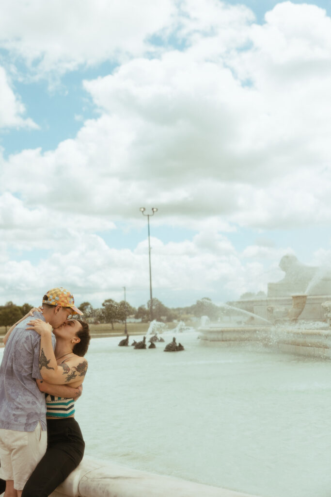 Couple kissing at the water fountain at Belle Isle