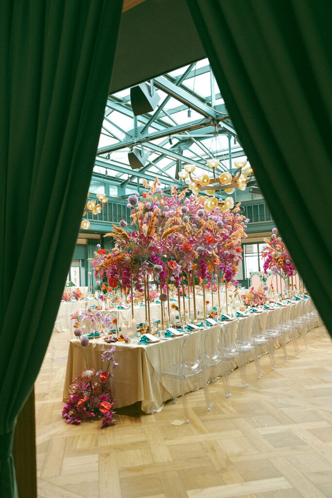 A colorful indoor Book Tower wedding anniversary dinner