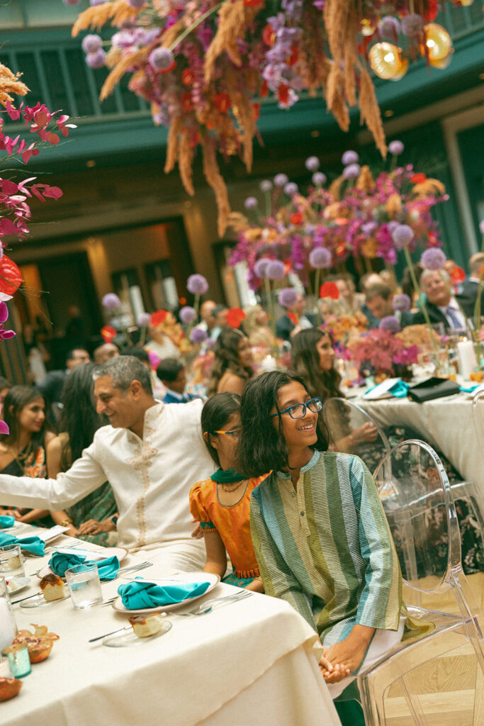 Guests smiling during speeches