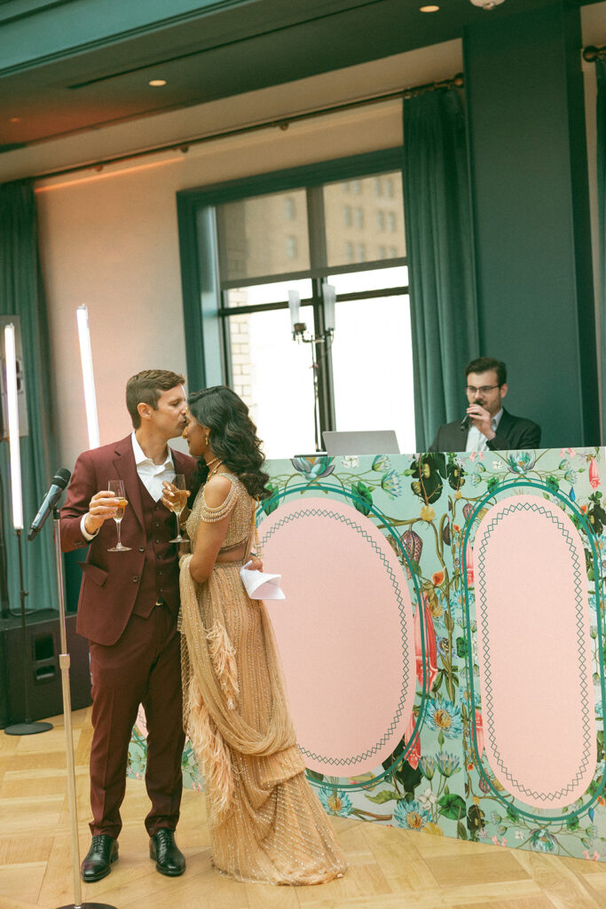 Couple kissing during speeches