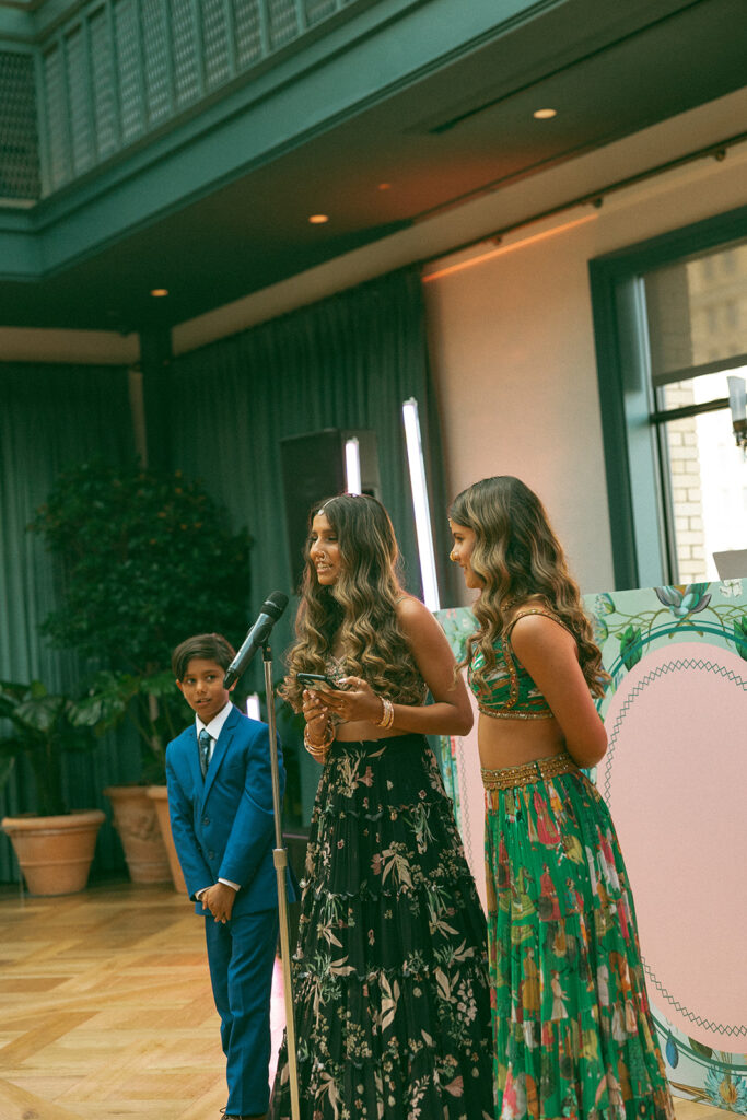 Couple three children giving a speech during their wedding anniversary 