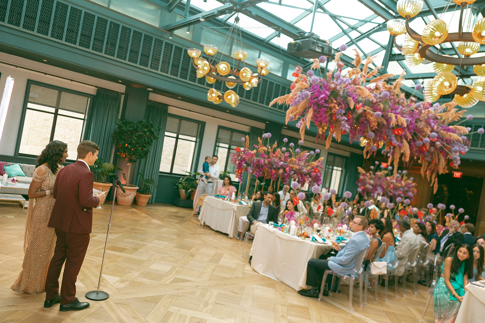 Couple giving a speech during their 20 year anniversary dinner