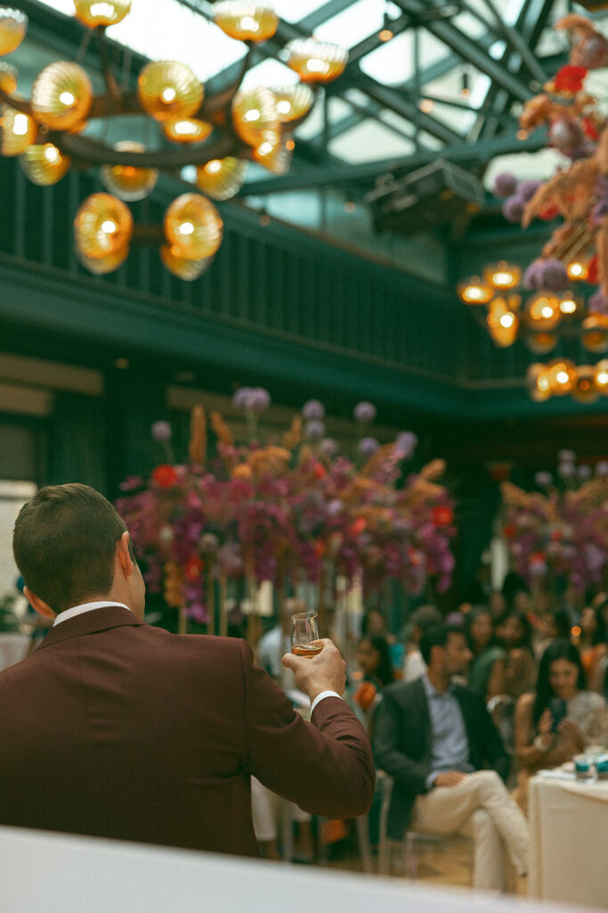 Groom toasting during speeches