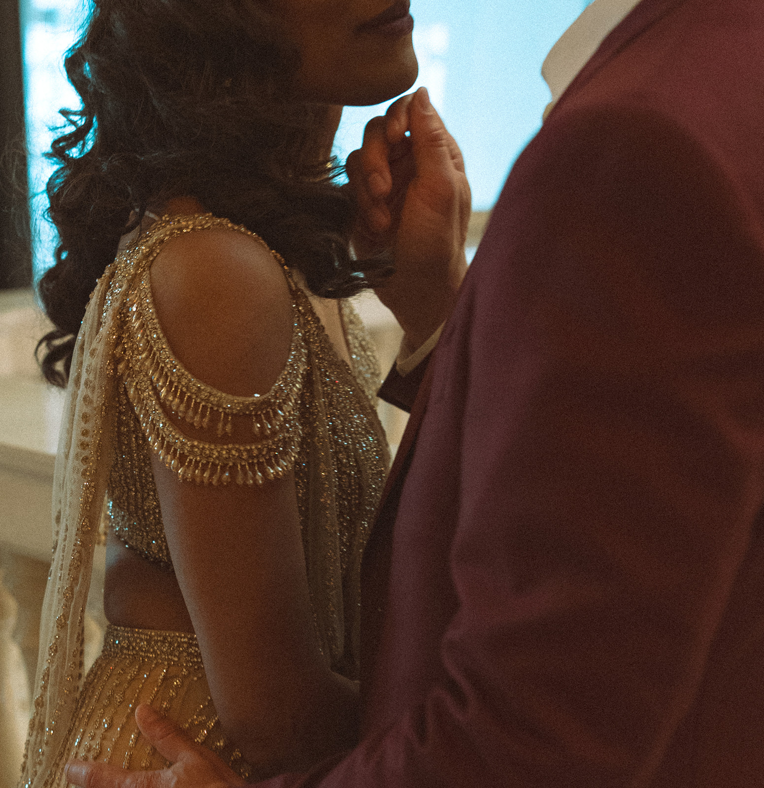 Couple posing for their Book Tower wedding anniversary portraits in Detroit, Michigan 