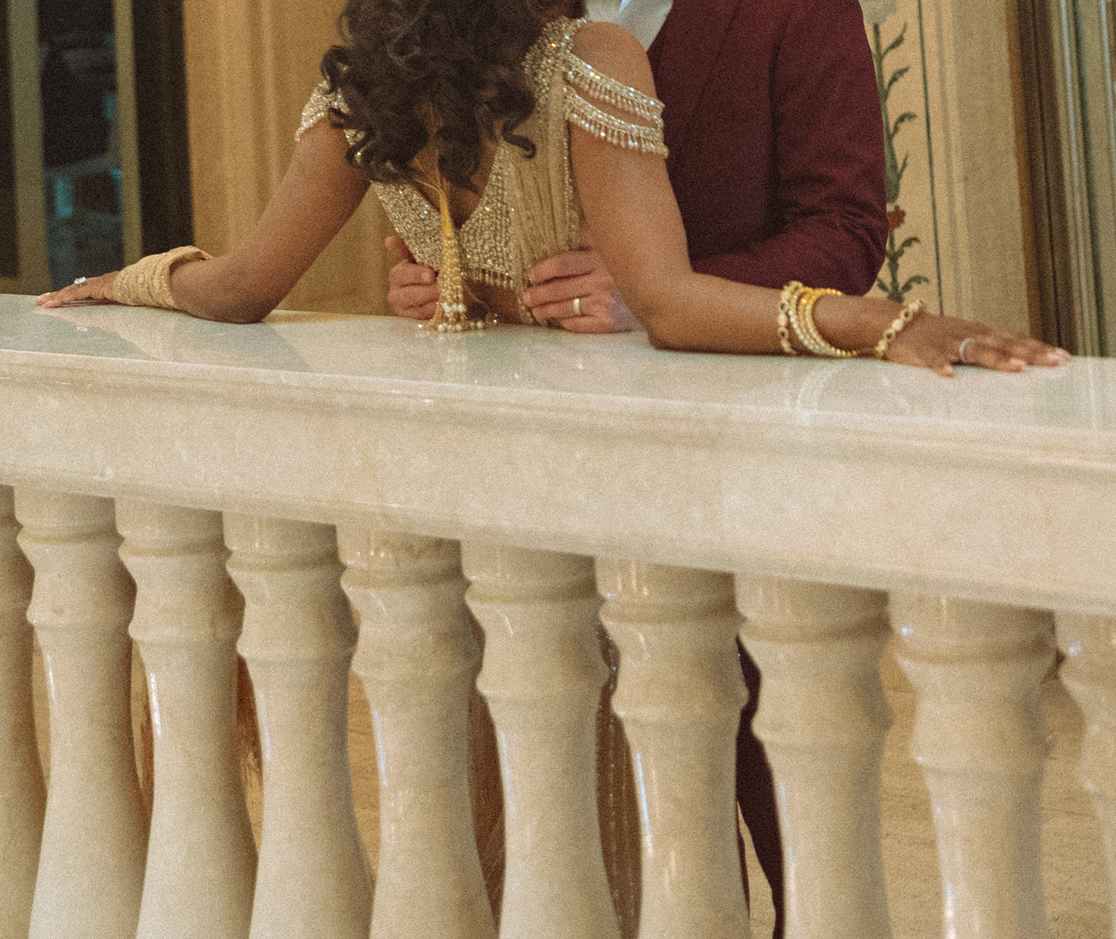 Couple posing for their Book Tower wedding anniversary portraits in Detroit, Michigan 