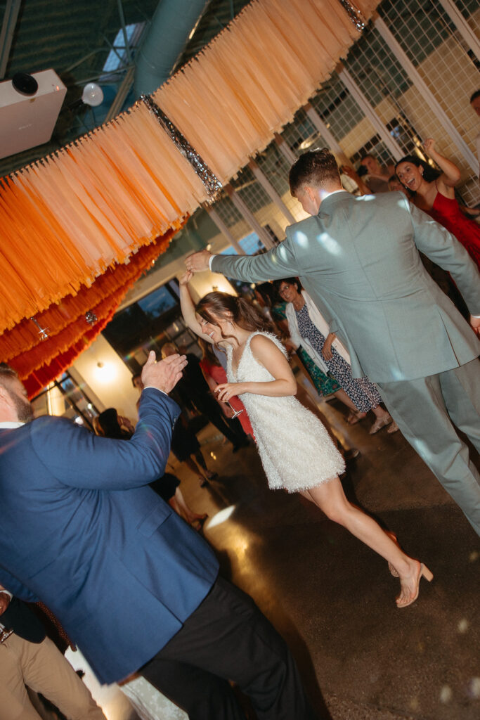 Bride and groom dancing during the reception