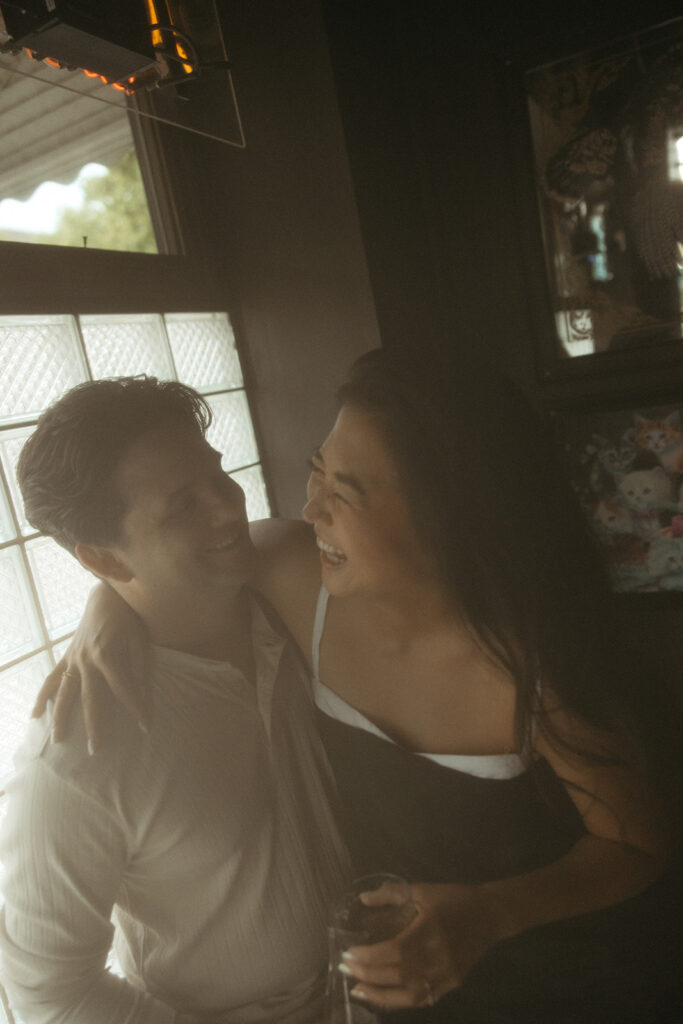 Couple laughing during their photoshoot