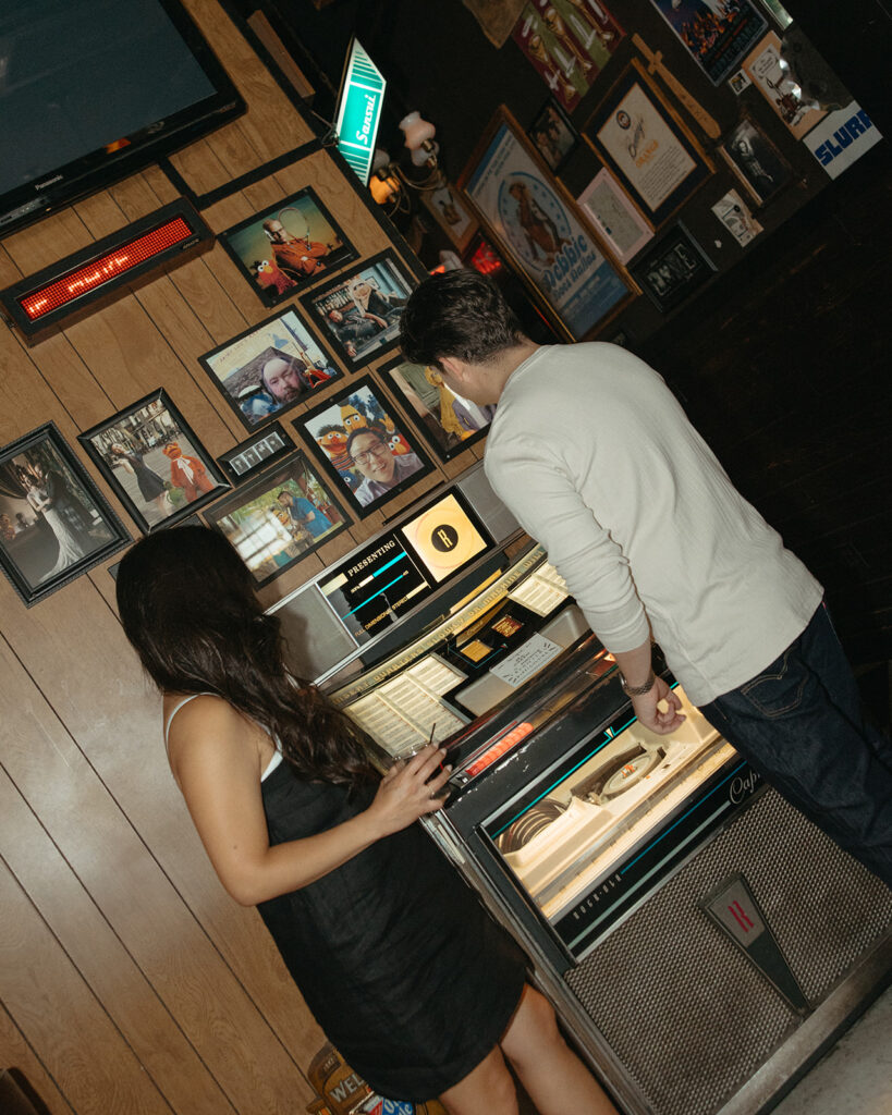 Couple checking out the music box