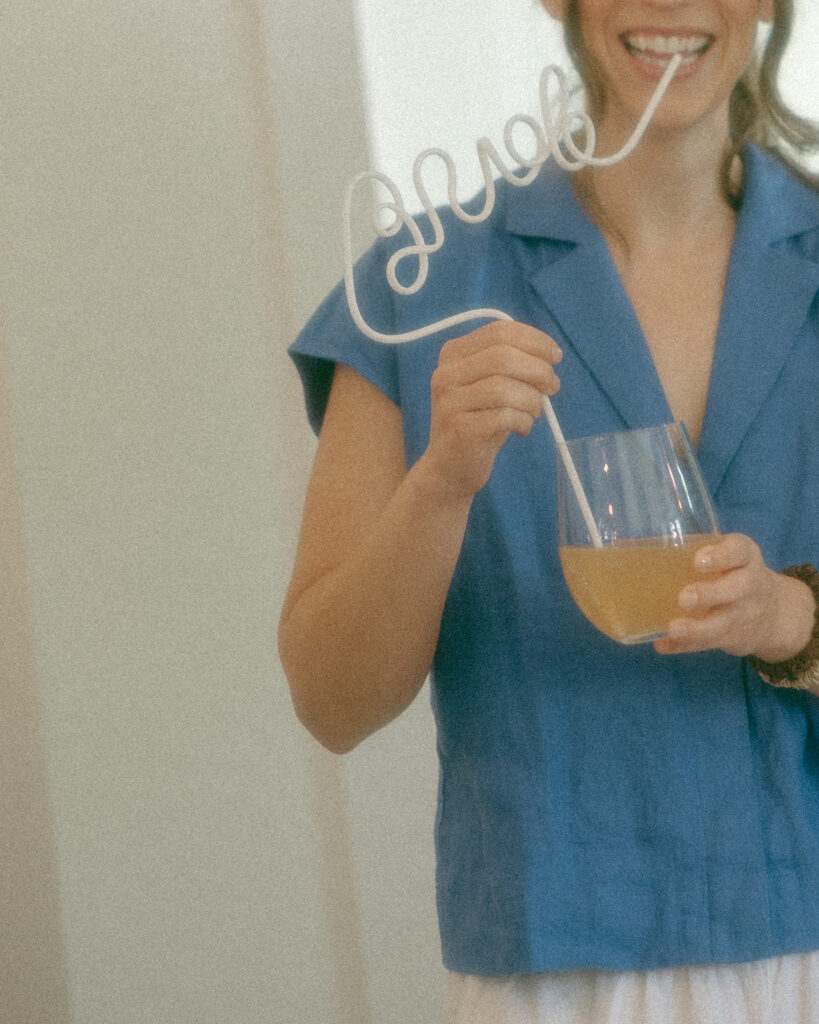 Bride sipping out of a bendy straw that says bride