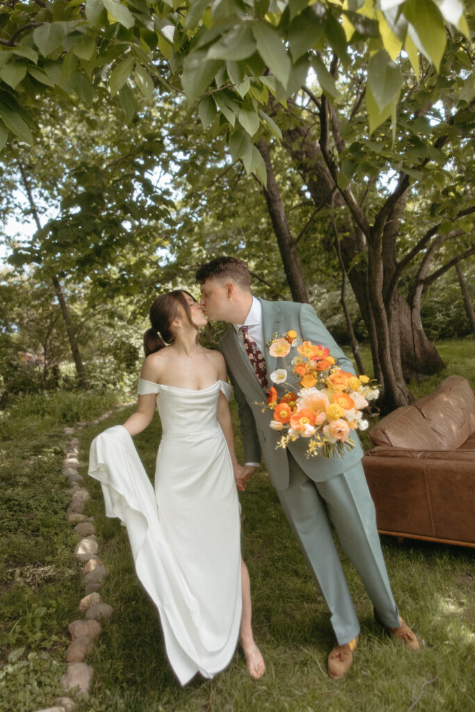 Outdoor bride and grooms portraits from a backyard Ann Arbor wedding