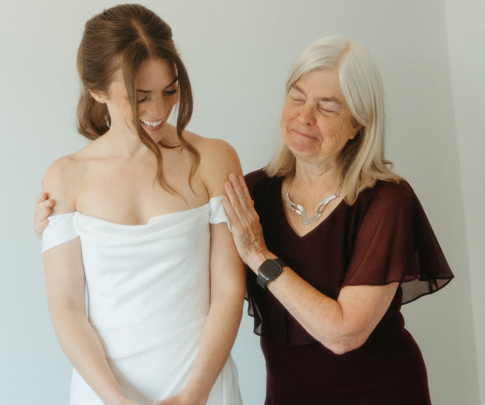 Bride and her mother sharing a moment