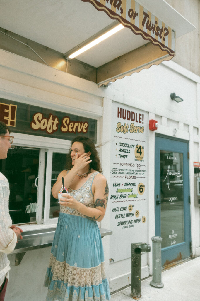 Couple getting ice cream from Huddle Ice Cream in Detroit. Michigan