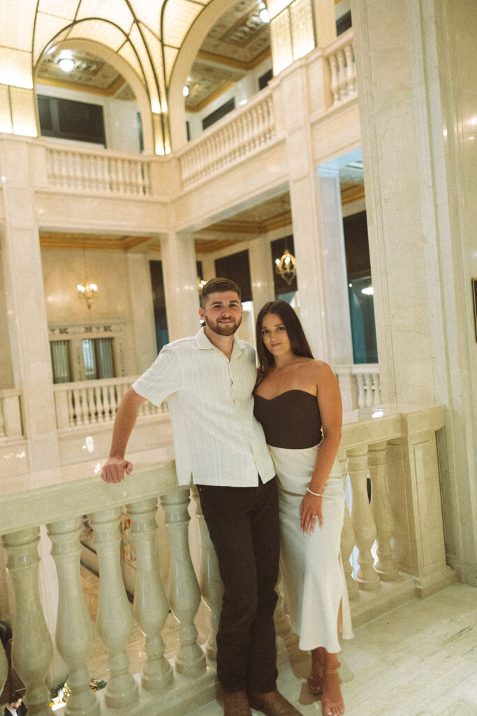 Couple posing at Book Tower in Detroit