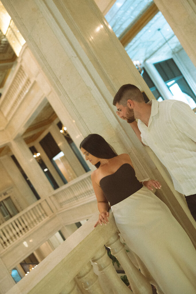 Couple posing at Book Tower in Detroit