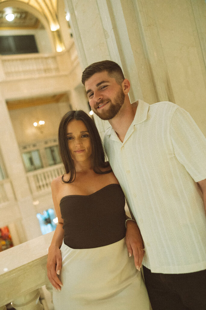 Couple posing at Book Tower in Detroit