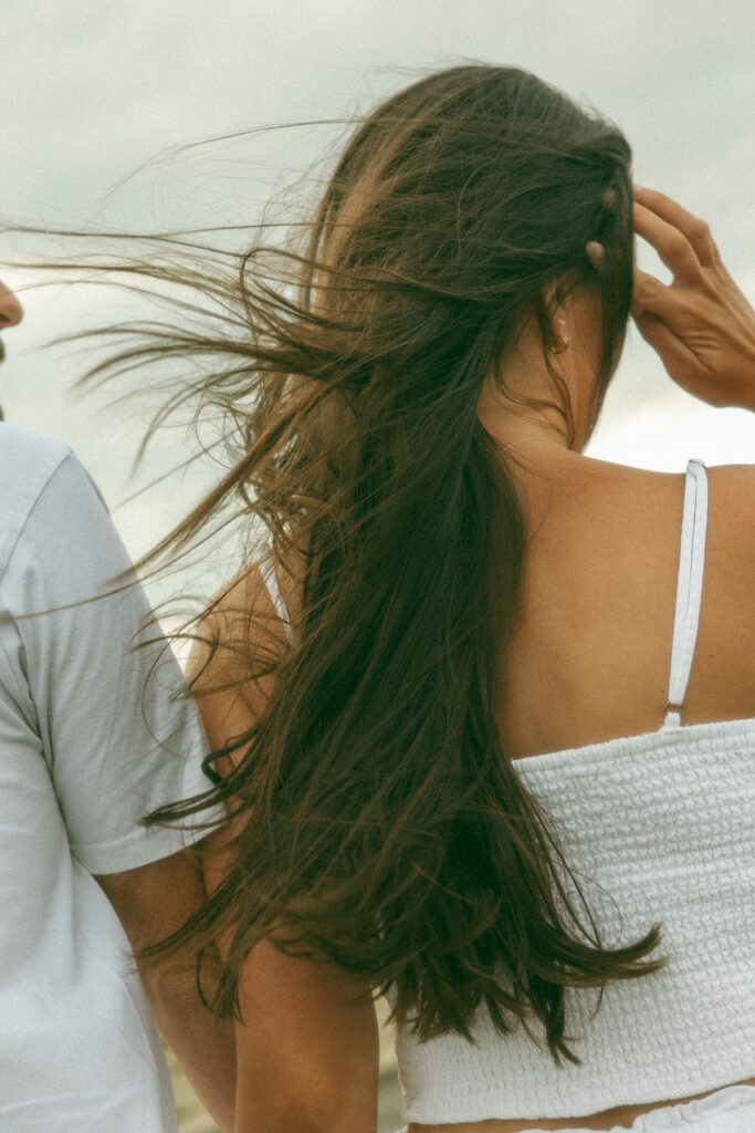 Close up photo of a couple walking at Belle Isle