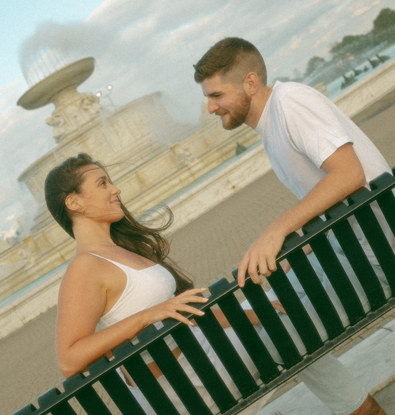 Couple sitting on a park bench at Belle Isle in Detroit