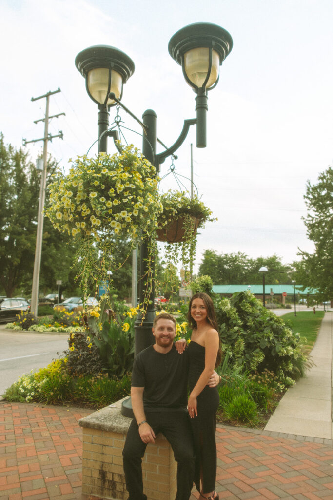 Couple posing for their downtown Midland engagement shoot