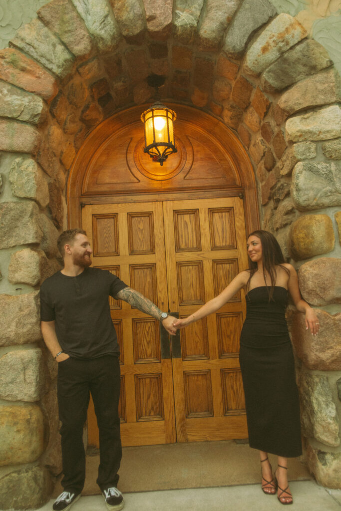 Couple posing at The H Hotel in Midland, Michigan