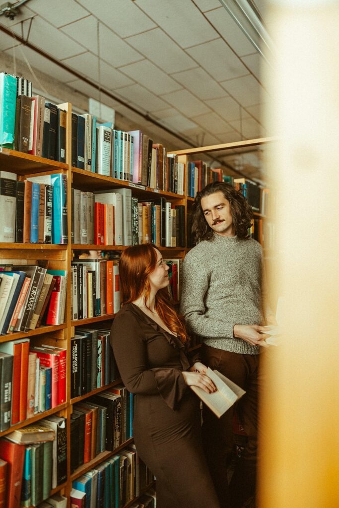 Couples Detroit engagement photos at John K. King Books