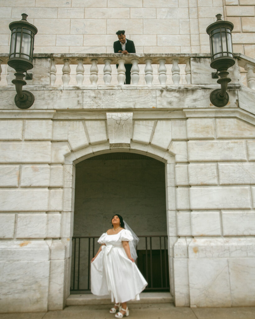 Couple posing at The Detroit Institute of Arts.