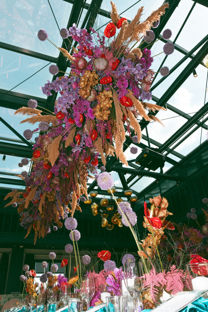 An indoor Book Tower wedding reception in The Conservatory