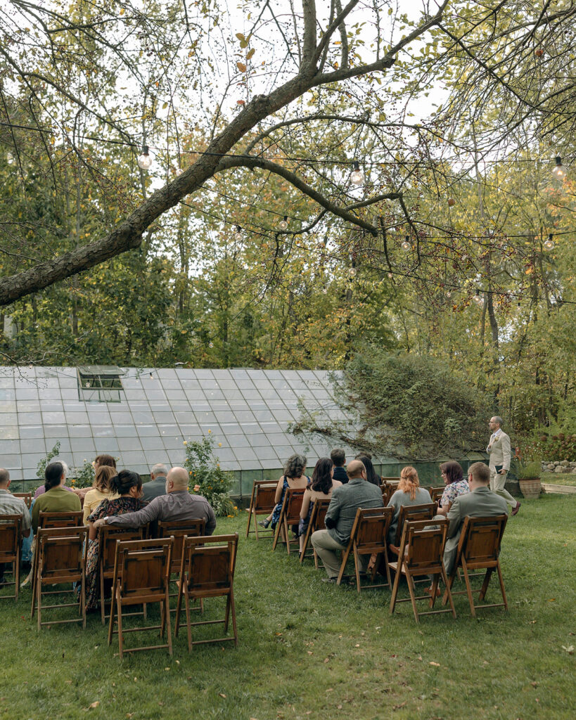 Intimate outdoor wedding ceremony at Glass House Creative Community in Zeeland, MI