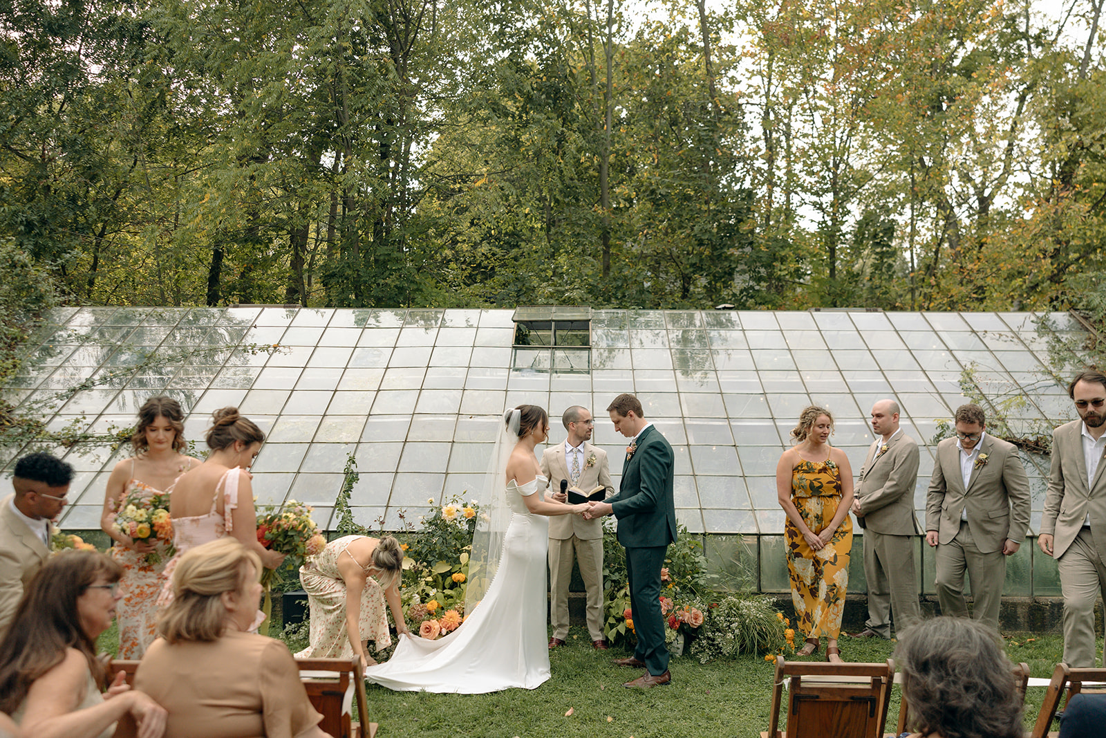 Intimate outdoor wedding ceremony at Glass House Creative Community in Zeeland, MI