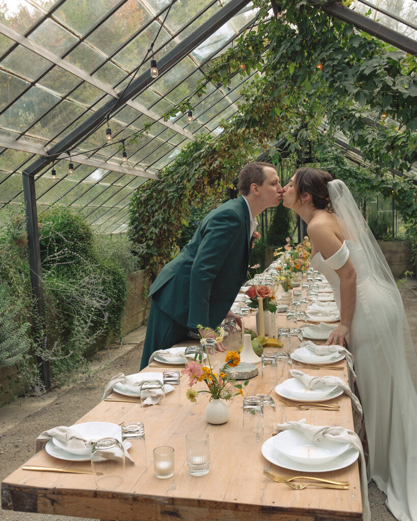 Bride and grooms Glass House Creative Community wedding reception room reveal in the greenhouse