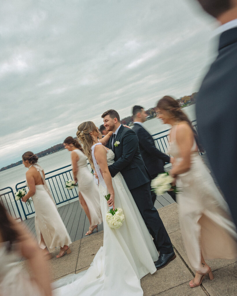 Candid wedding party photos at The Pier in Holland, MI