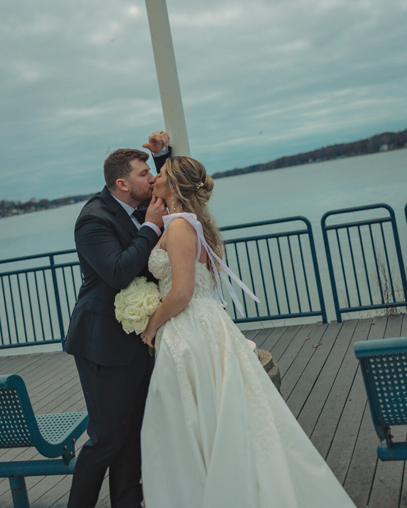 Bride and grooms Holland MI wedding portraits at Heinz waterfront walkway