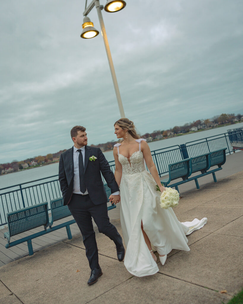 Bride and grooms Holland MI wedding portraits at Heinz waterfront walkway