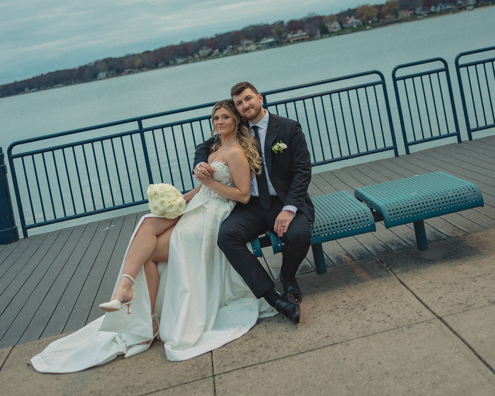 Bride and grooms portraits at Heinz Waterfront Walkway in Holland, MI