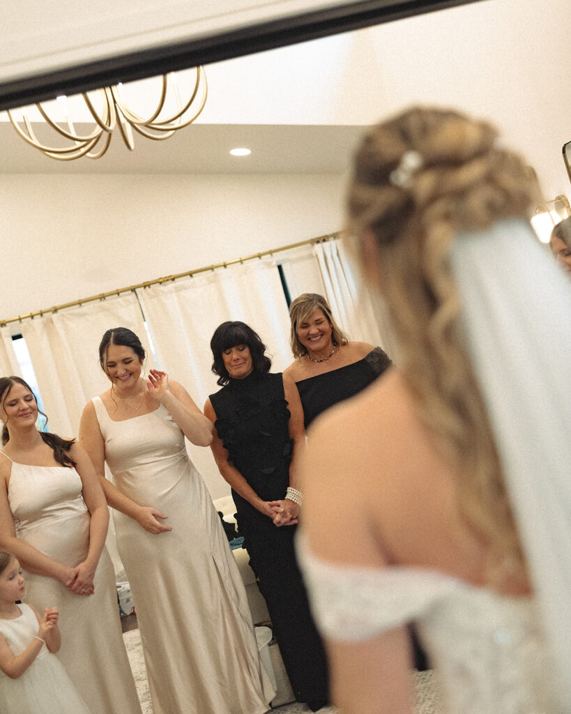 Brides first look with her bridesmaids