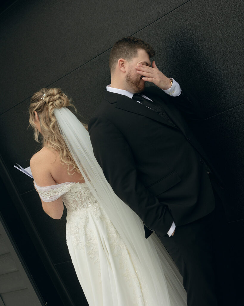 Groom getting emotional as bride reads her vows to him