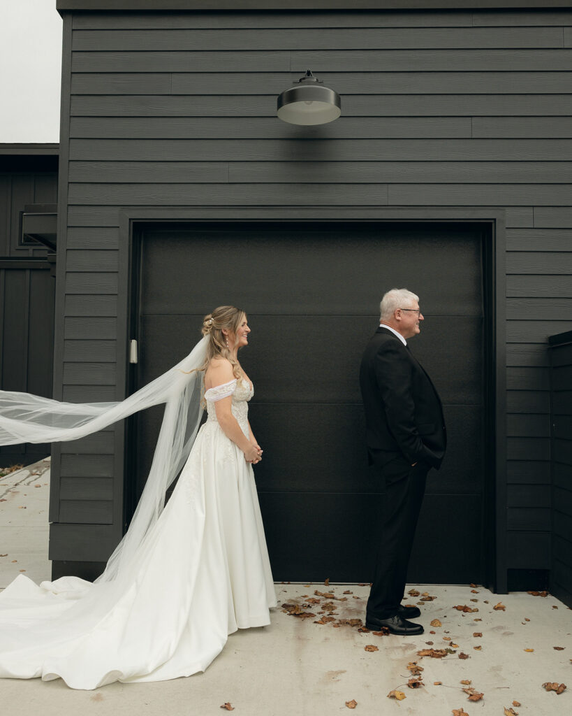 Bride sharing a first look with her father