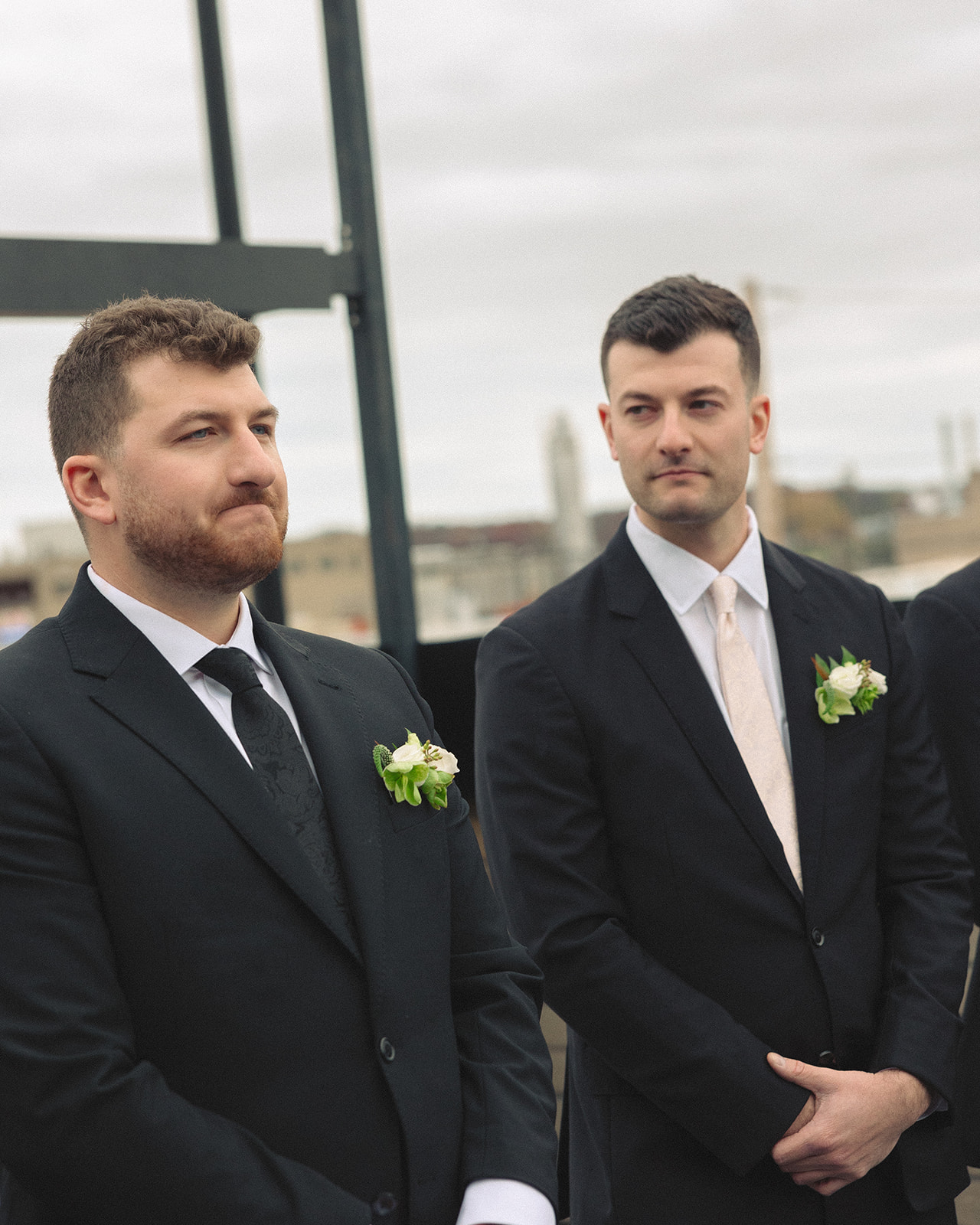 Groom watching his bride walk down the aisle