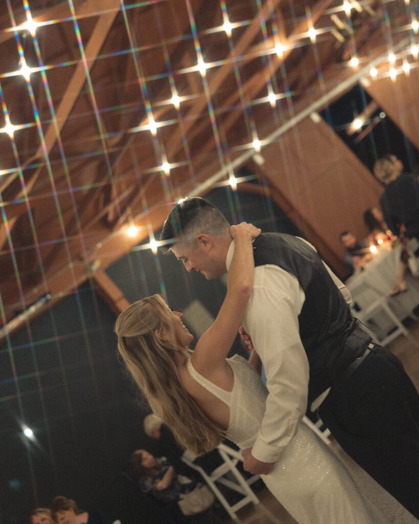 Bride and groom sharing a first dance in The Summerhouse at Fox Hills Golf Course