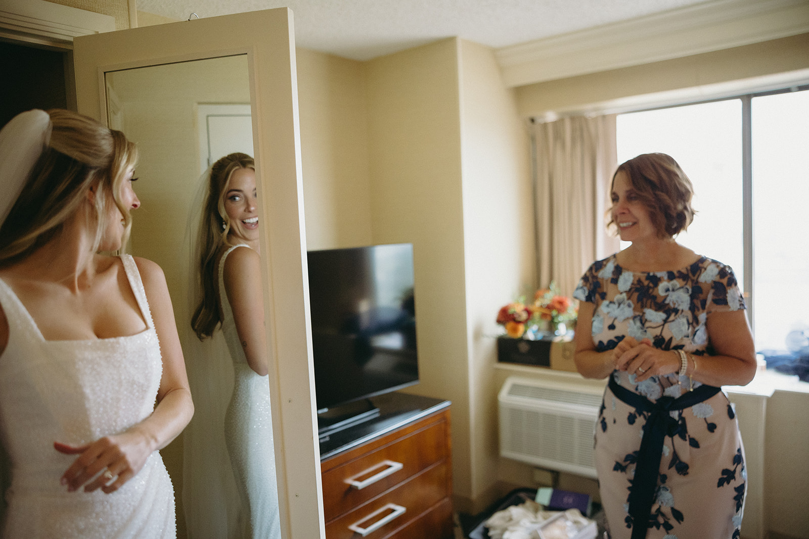 Bride getting ready with her mother