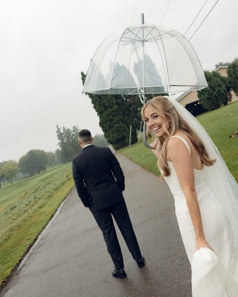 Bride and groom sharing a first look outside of Fox Hills Golf Club - Greater Detroit wedding venue