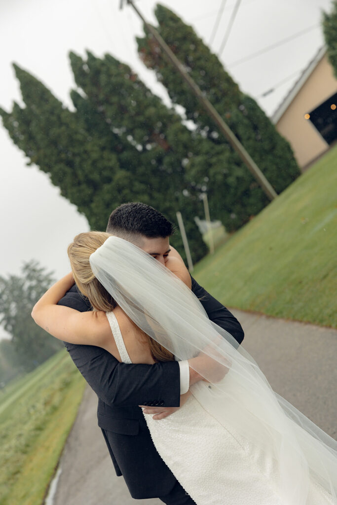 Bride and groom sharing a first look outside of Fox Hills Golf Club - Greater Detroit wedding venue