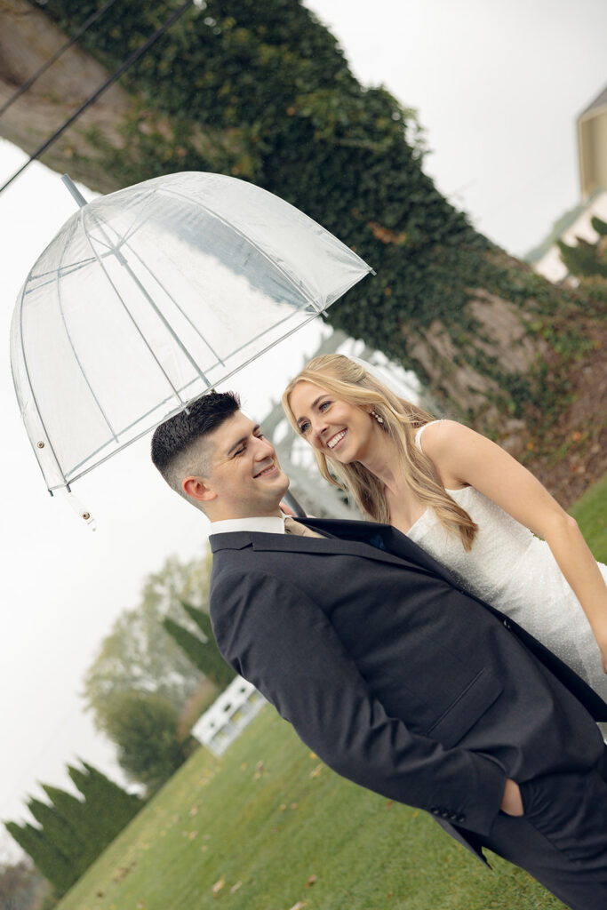 Rainy outdoor bride and groom portraits at Fox Hill Golf Club - Greater Detroit wedding venue