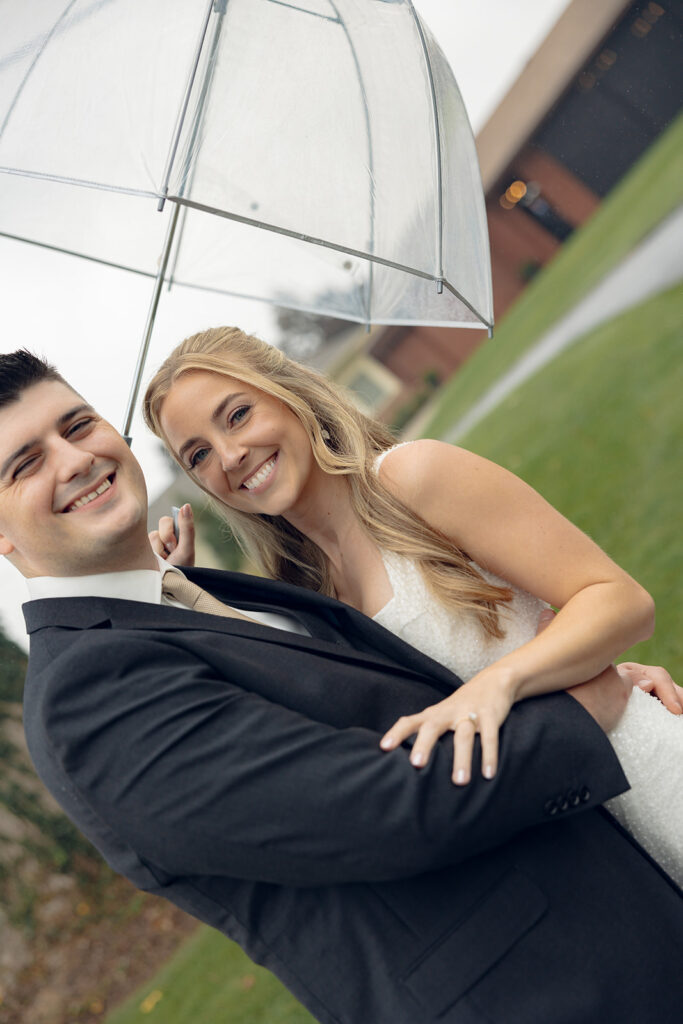 Rainy outdoor bride and groom portraits at Fox Hill Golf Club - Greater Detroit wedding venue