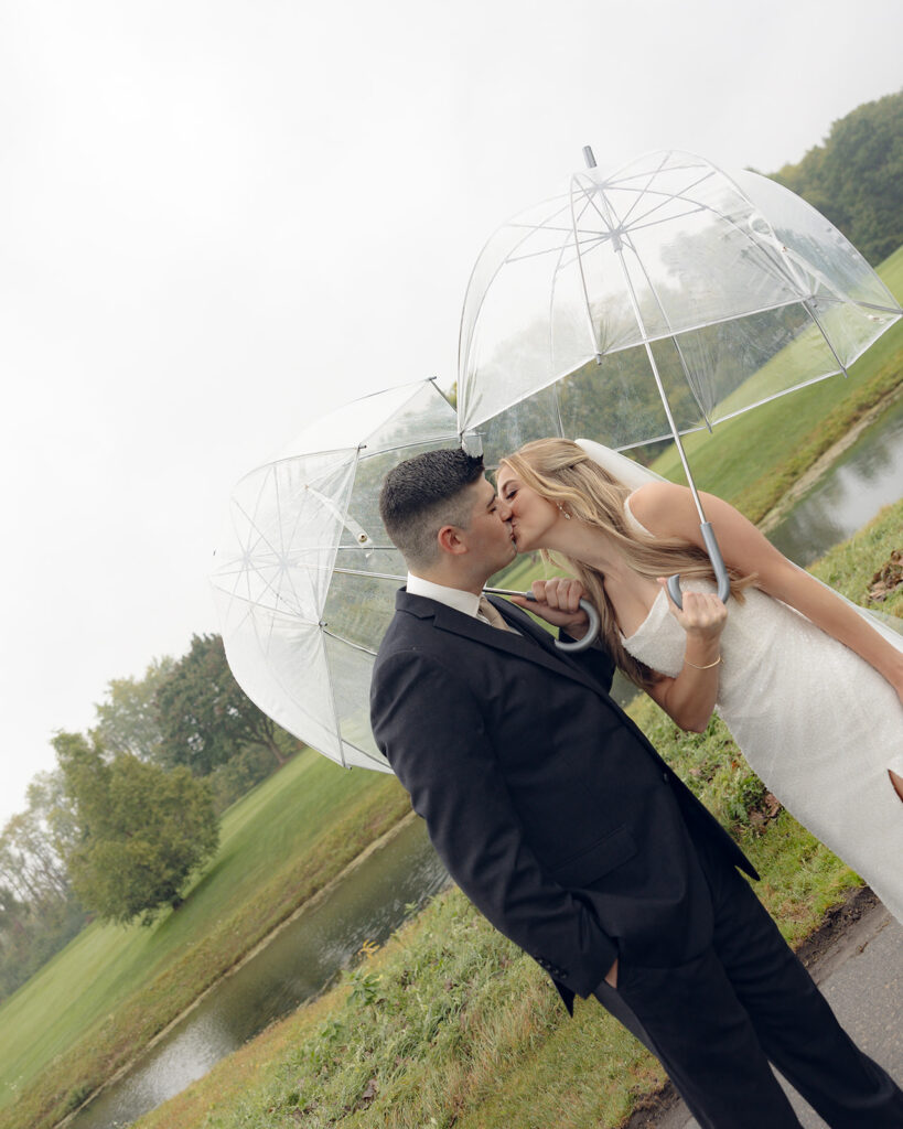 Rainy outdoor bride and groom portraits at Fox Hill Golf Club - Greater Detroit wedding venue