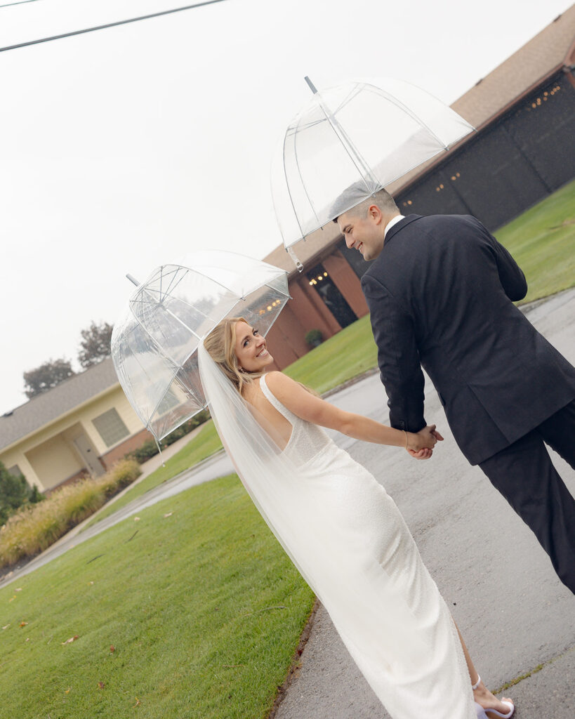 Rainy outdoor bride and groom portraits at Fox Hill Golf Club - Greater Detroit wedding venue