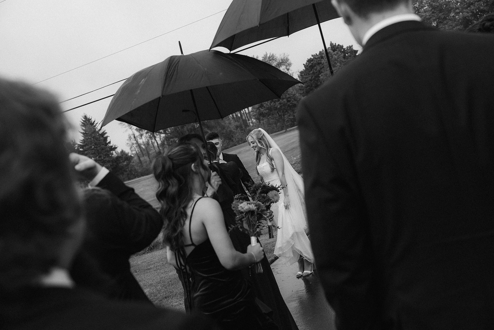 Rainy outdoor wedding party photos at Fox Hill Golf Club - Greater Detroit wedding venue