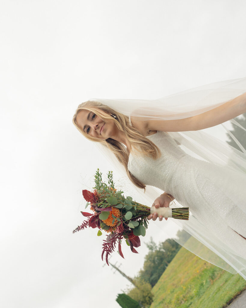 Rainy outdoor bridal portraits at Fox Hill Golf Club - Greater Detroit wedding venue