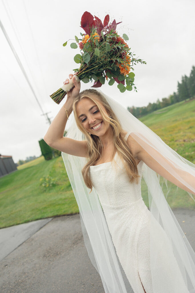 Rainy outdoor bridal portraits at Fox Hill Golf Club - Greater Detroit wedding venue