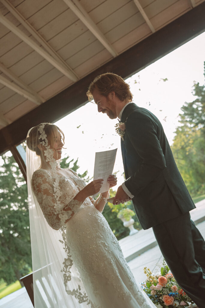 Bride reading her vows to her soon to be husband