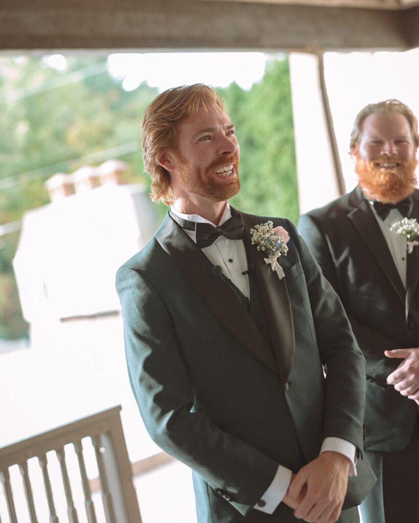 Groom getting emotional as he sees his bride walking to him